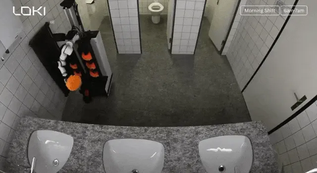 들개가 청소로봇을 물어뜯어 파괴하는 장면