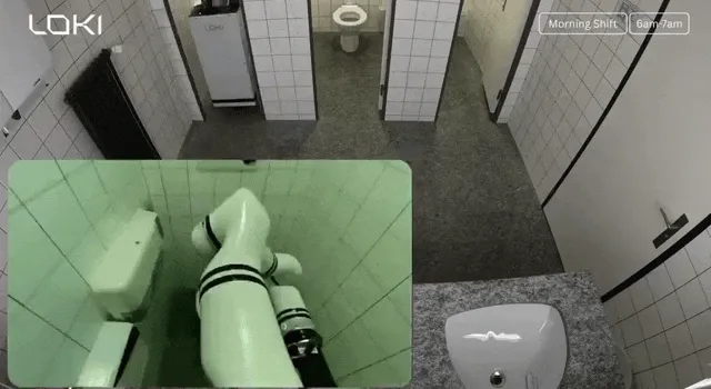 청소로봇이 바닥을 청소하는 모습을 보여주는 뉴스 화면