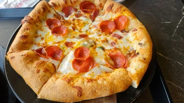 부산 이재모 피자 가게의 피자 2판과 4판 가격 또는 수량 비교 이미지