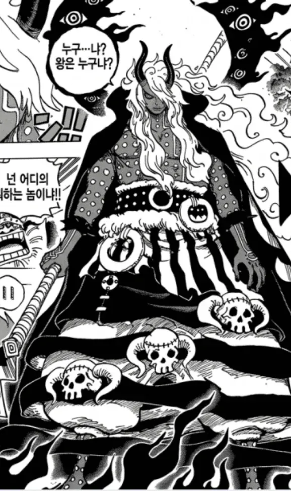 위협적으로 질문하는 원피스 캐릭터의 만화 장면