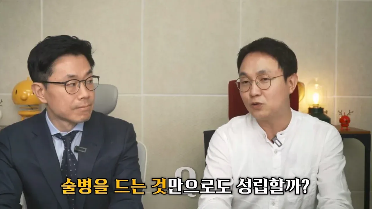 술병을 든 승리, 특수폭행 성립 여부 논란